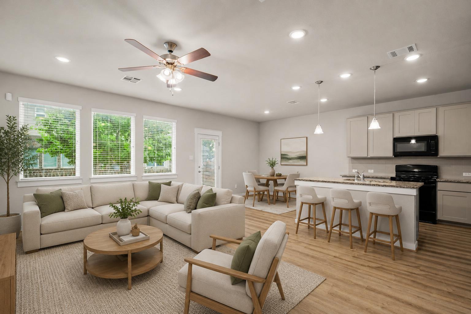 An open concept living area seamlessly connects t
