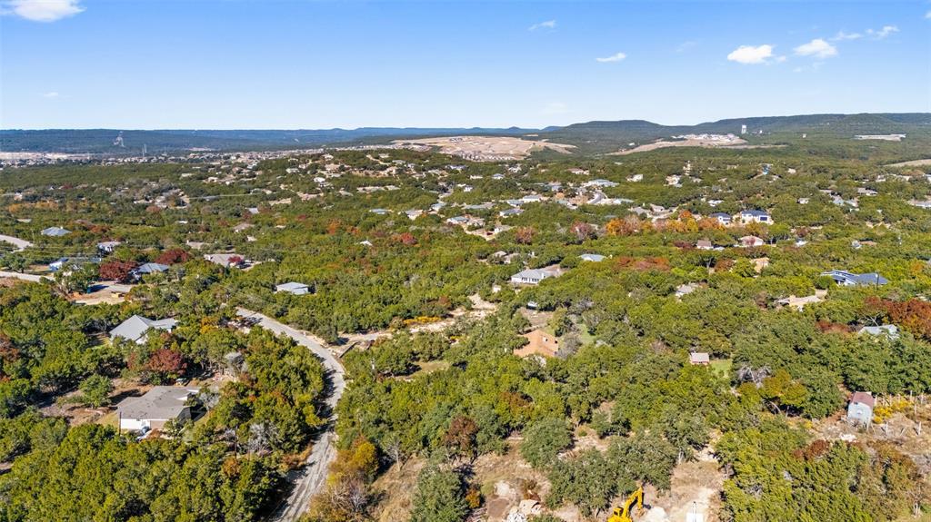 Rolling hills and dense tree cover surround this 