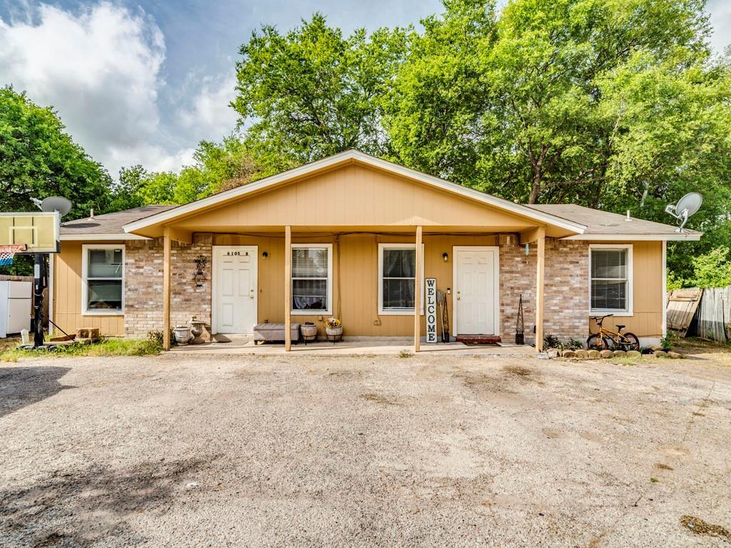 A classic duplex with inviting front porches, nes