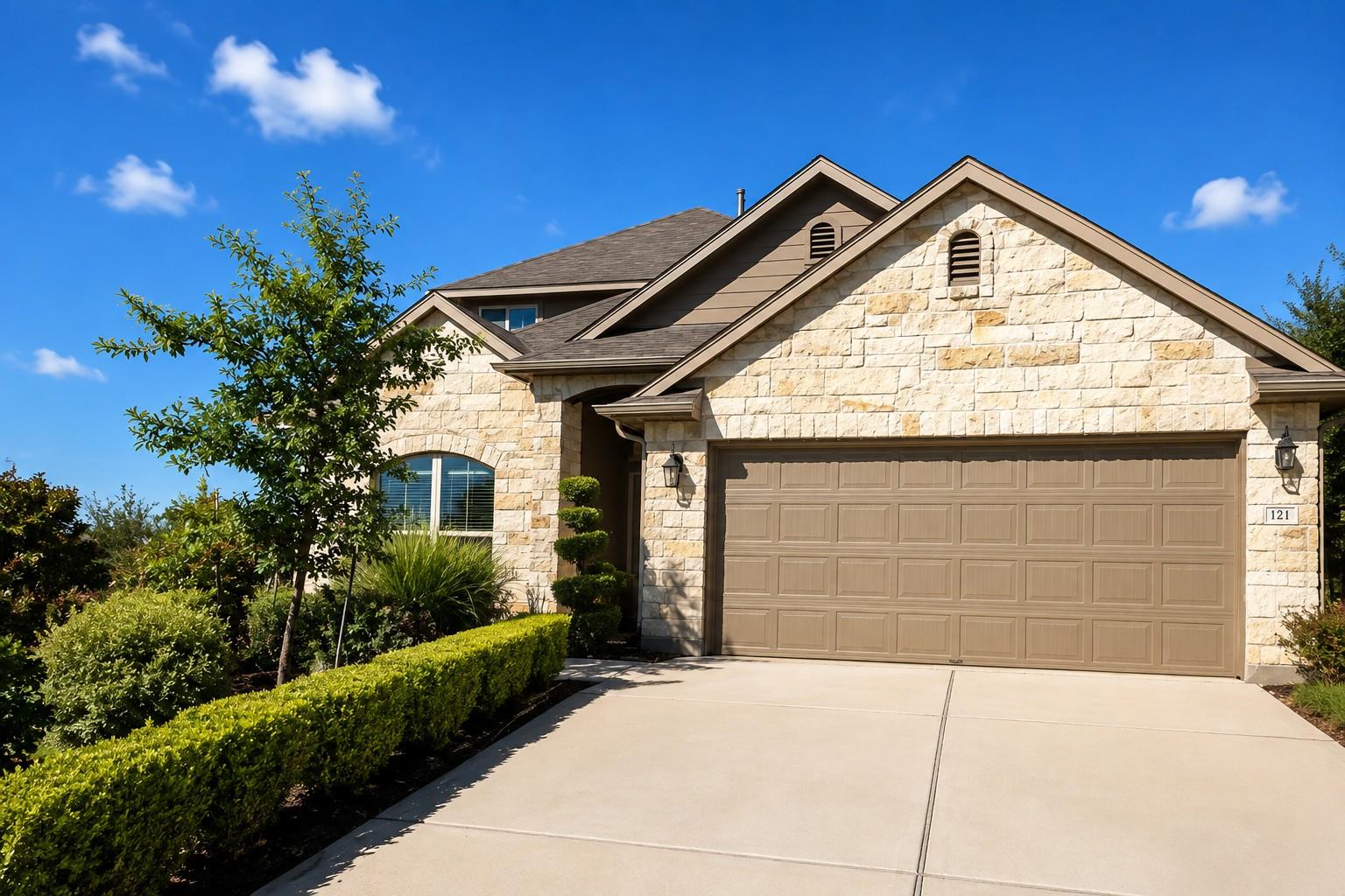 Elegant stone masonry graces the facade of this h