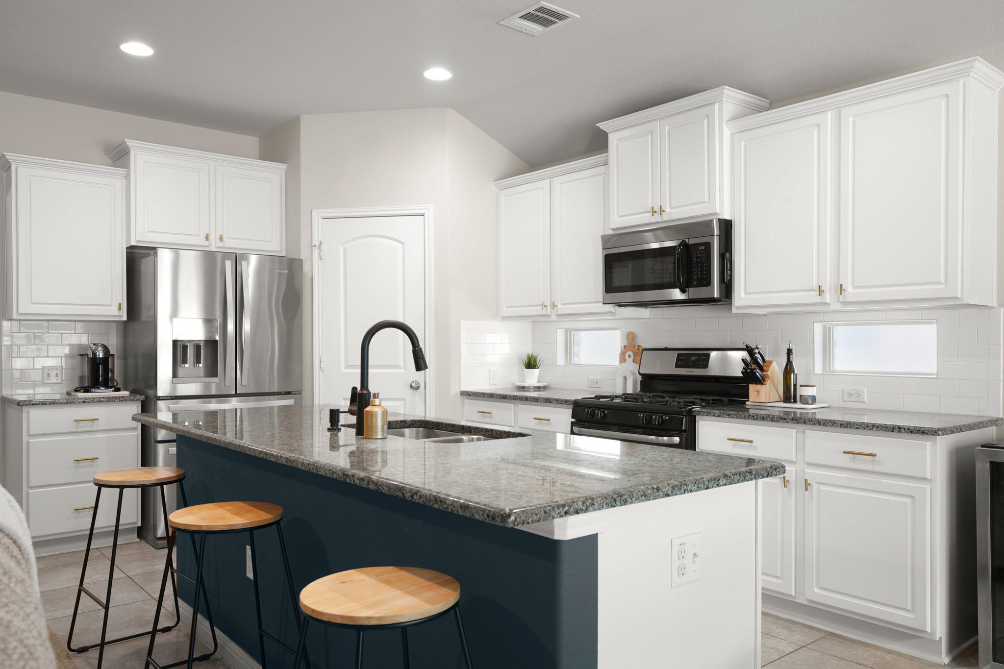 Granite counters and stainless steel appliances a