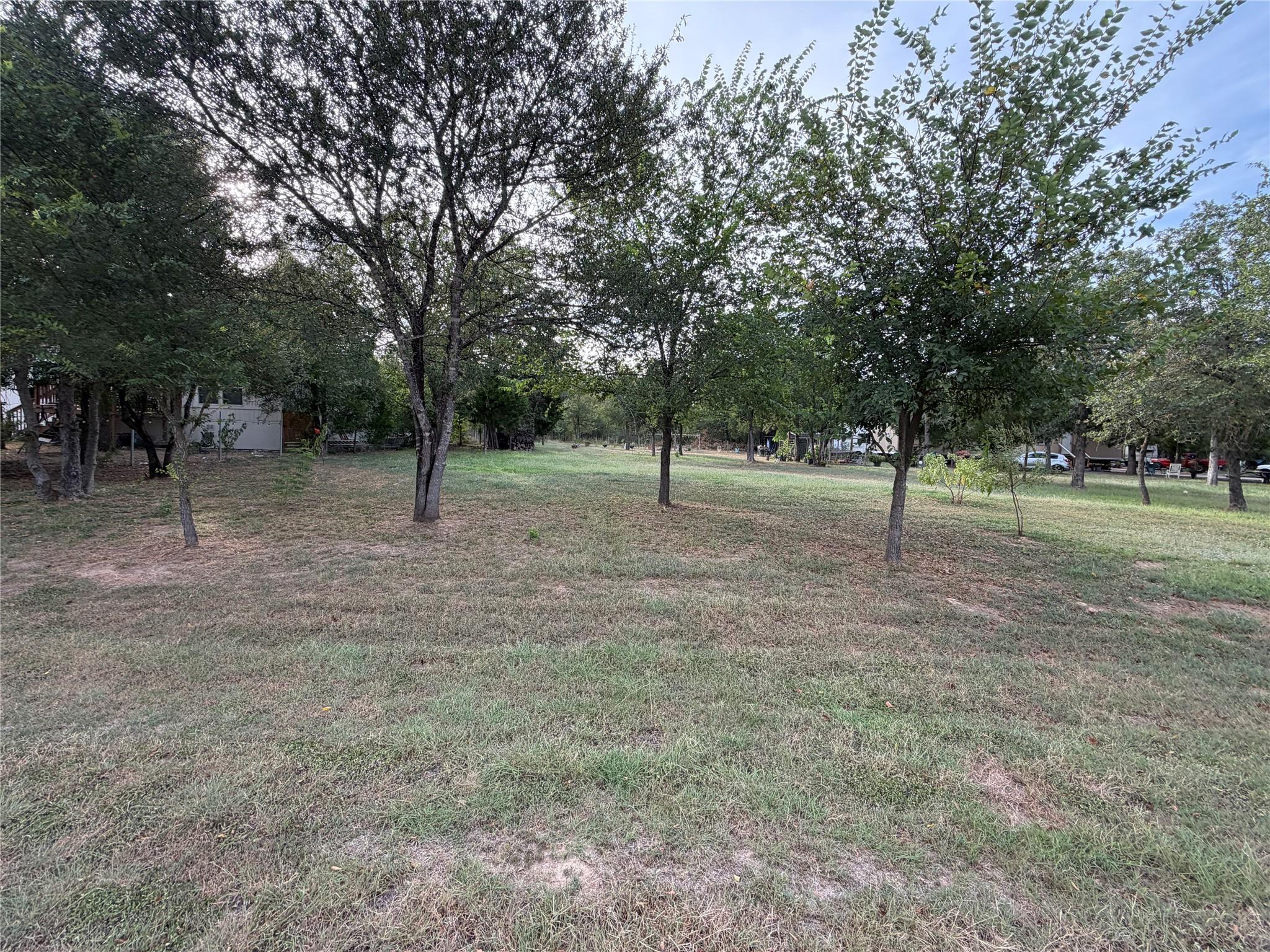 Mature trees dot this generously sized residentia