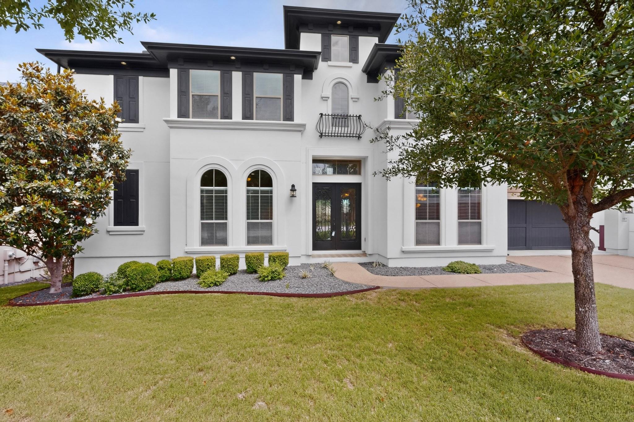 Elegant white stucco exterior with contrasting da