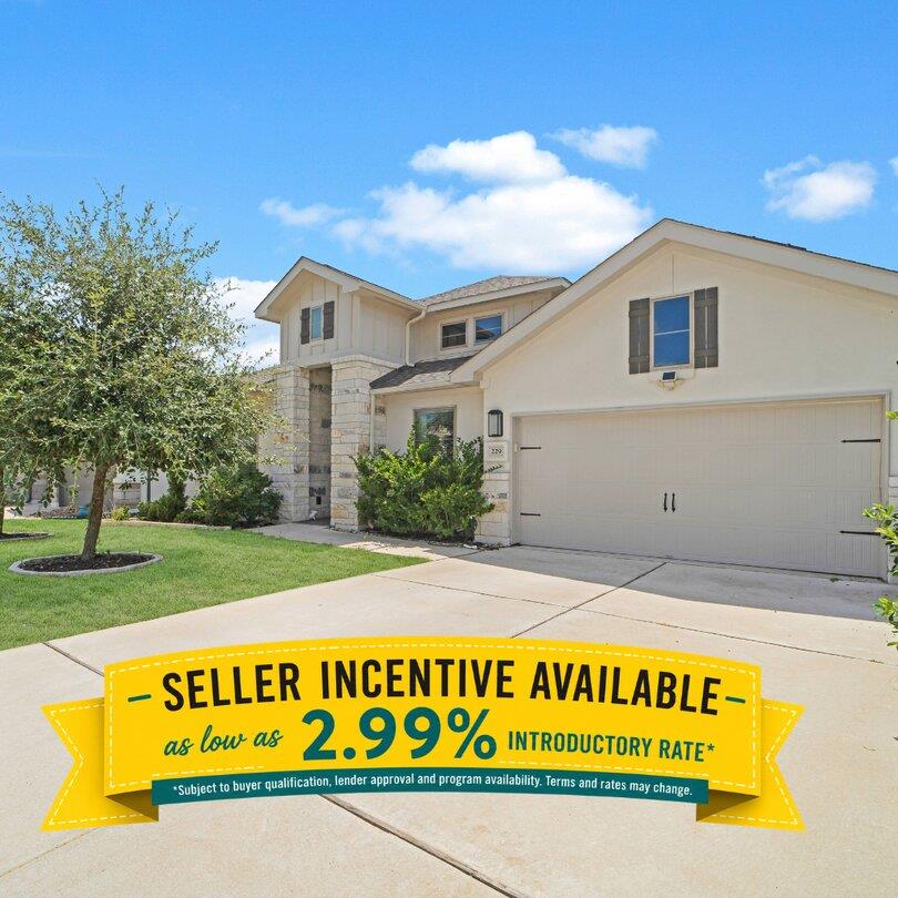 A well-kept front yard and a modern home with an 