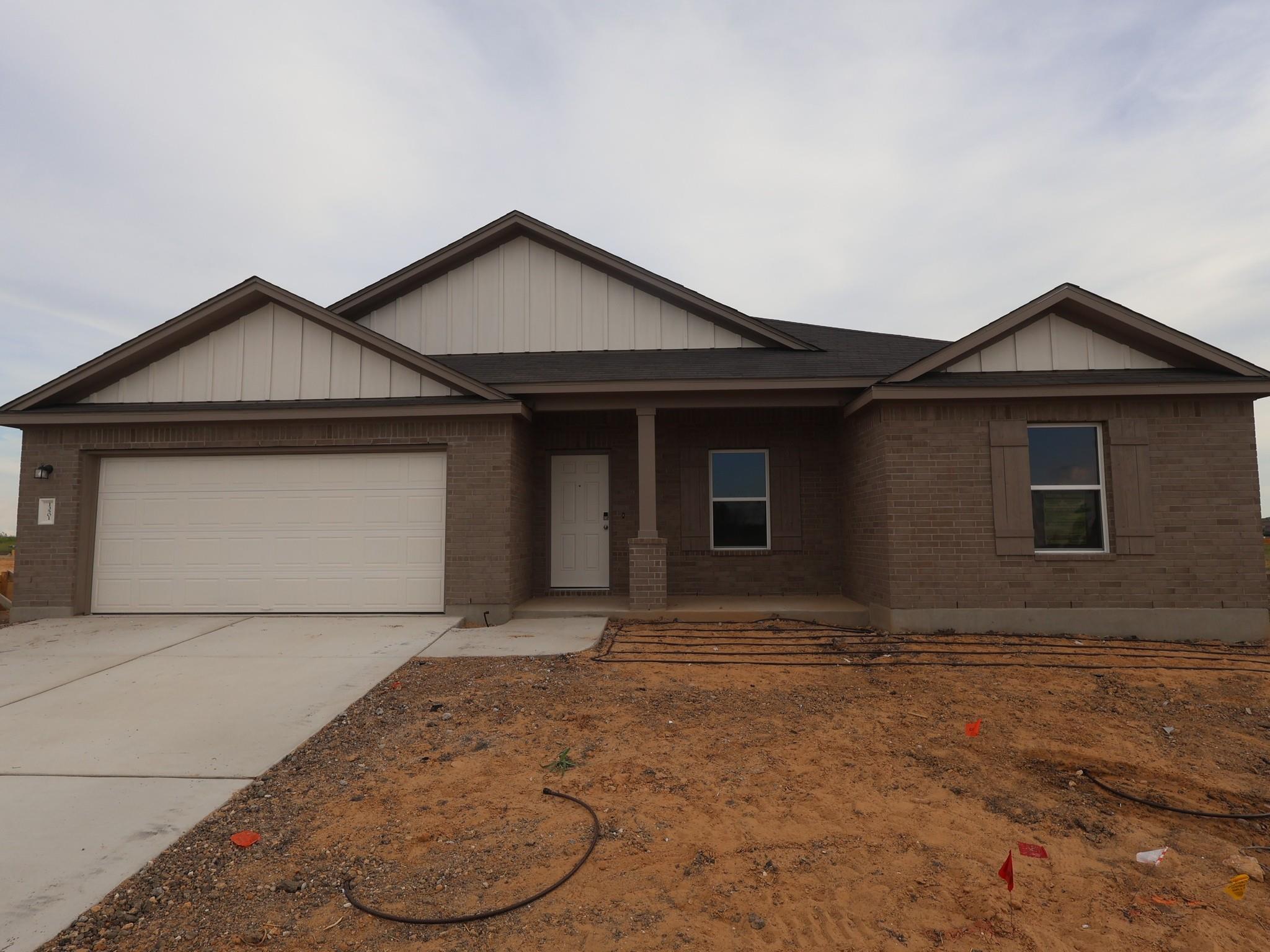 A classic brick exterior pairs with board and bat