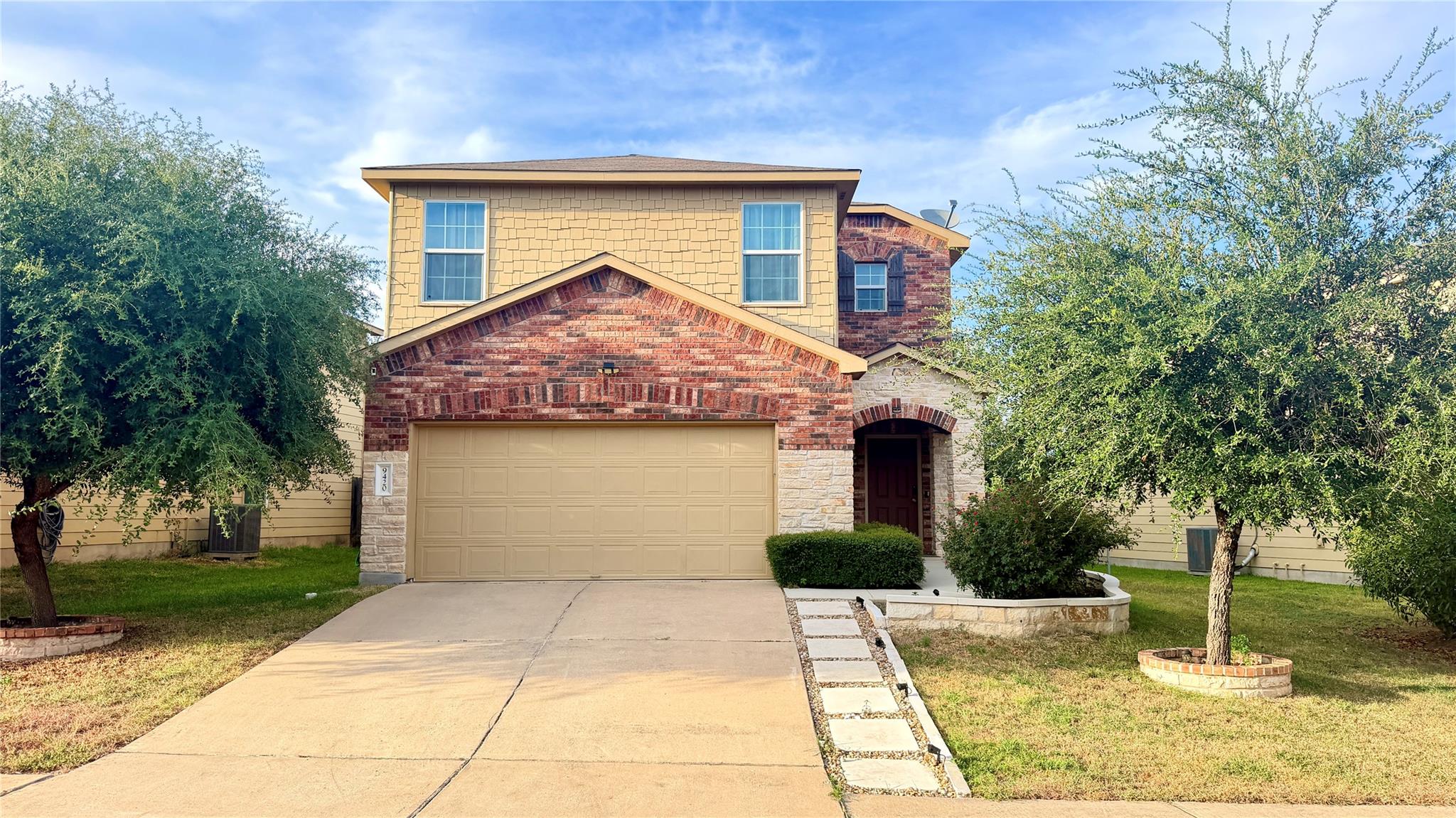 A classic brick and stone facade welcomes you to 