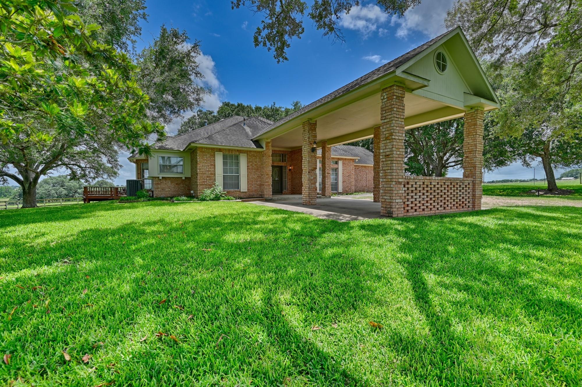 A well-maintained lawn welcomes you to this attra