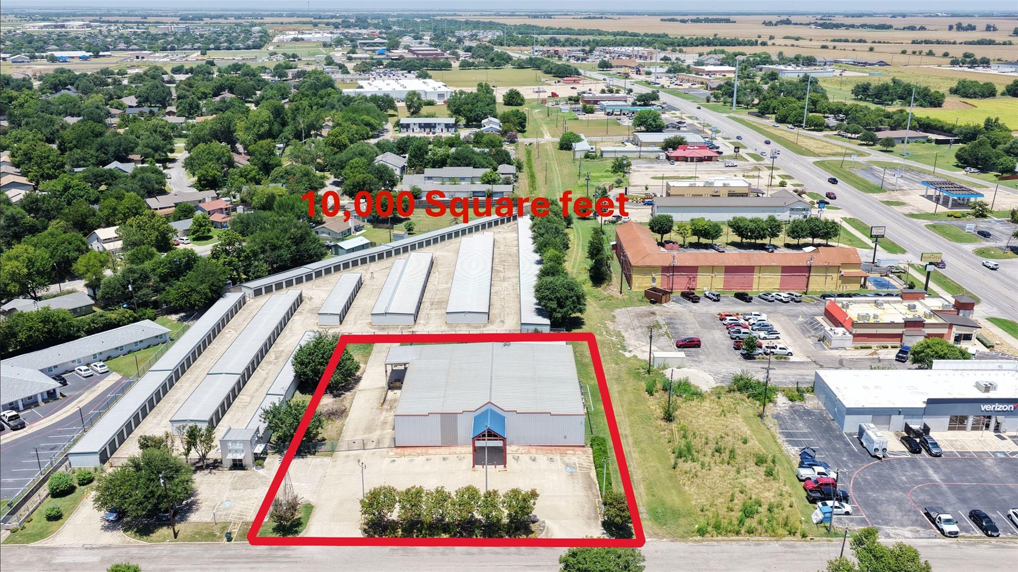 An aerial perspective reveals a prime commercial 
