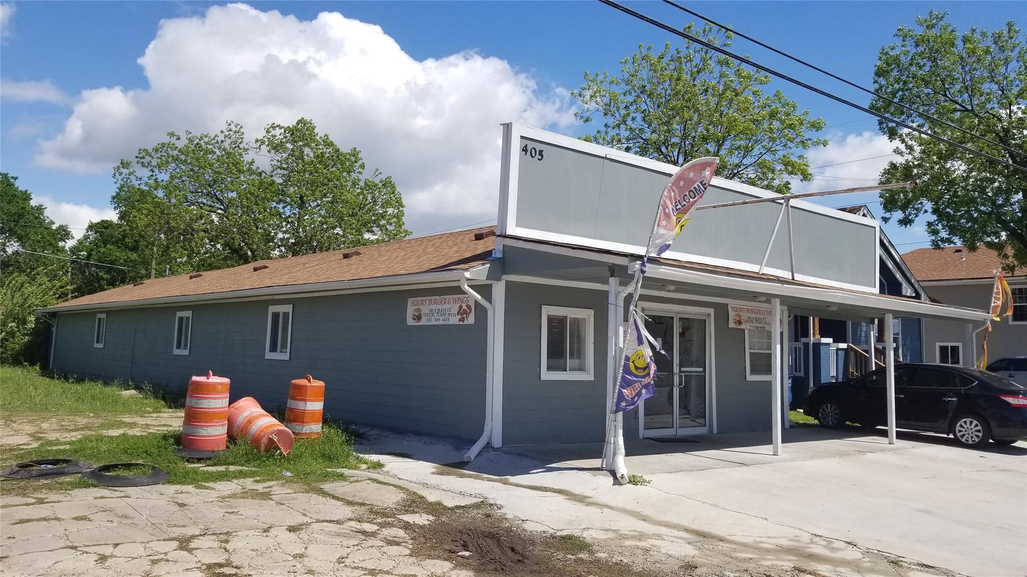 A modest commercial structure awaits its next ent