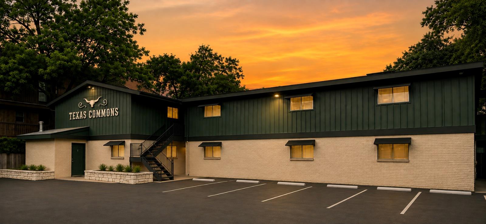 An inviting exterior with ample parking and verda