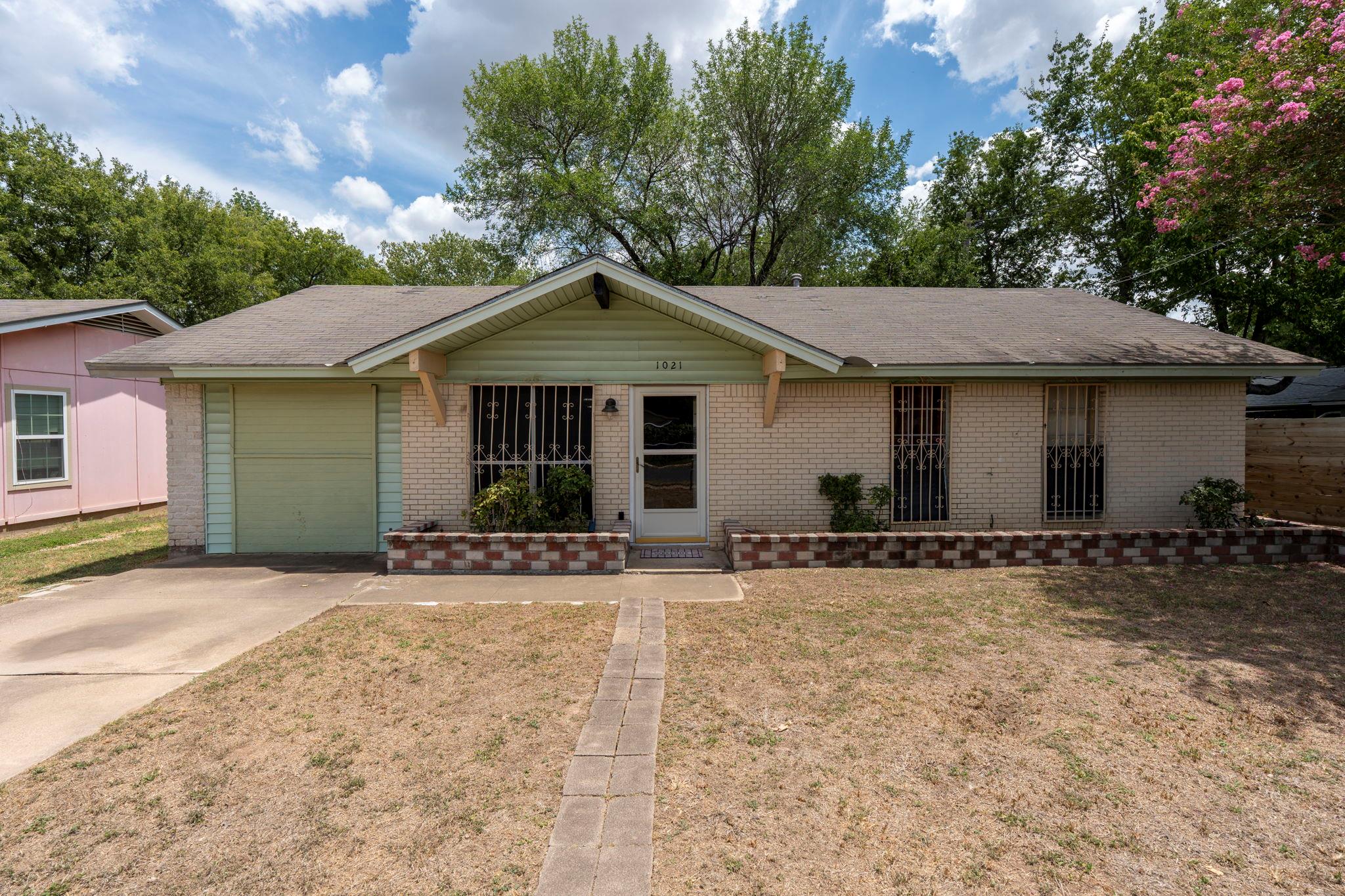 A classic brick exterior offers timeless curb app