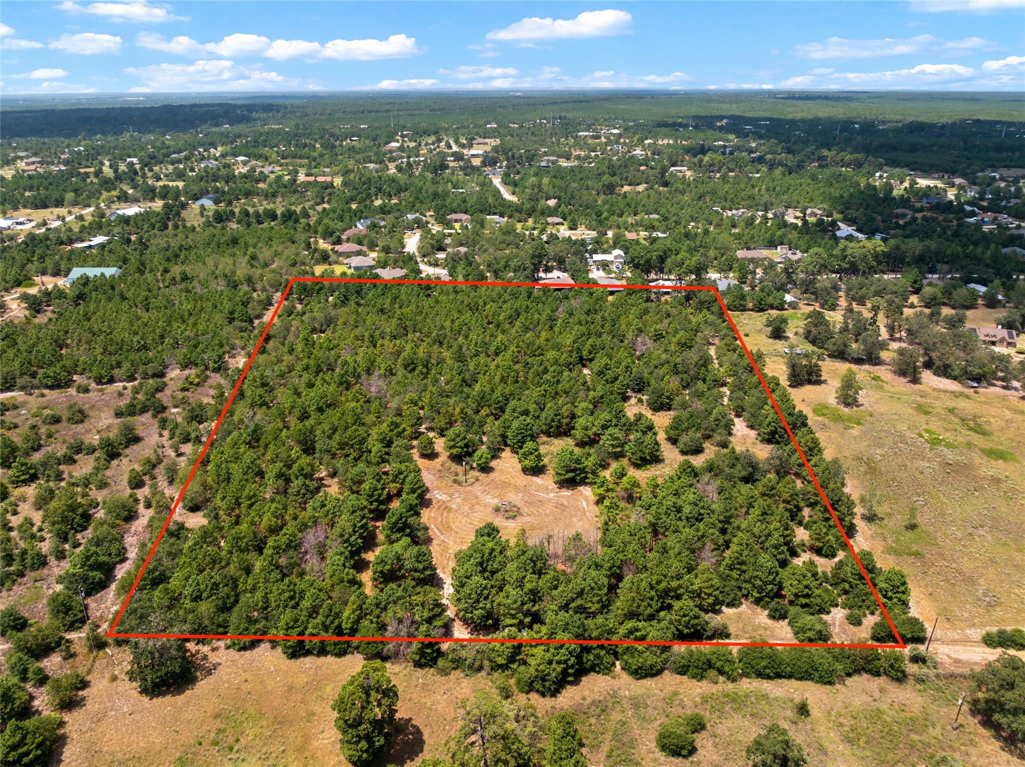 Dense woodlands outline this spacious and seclude