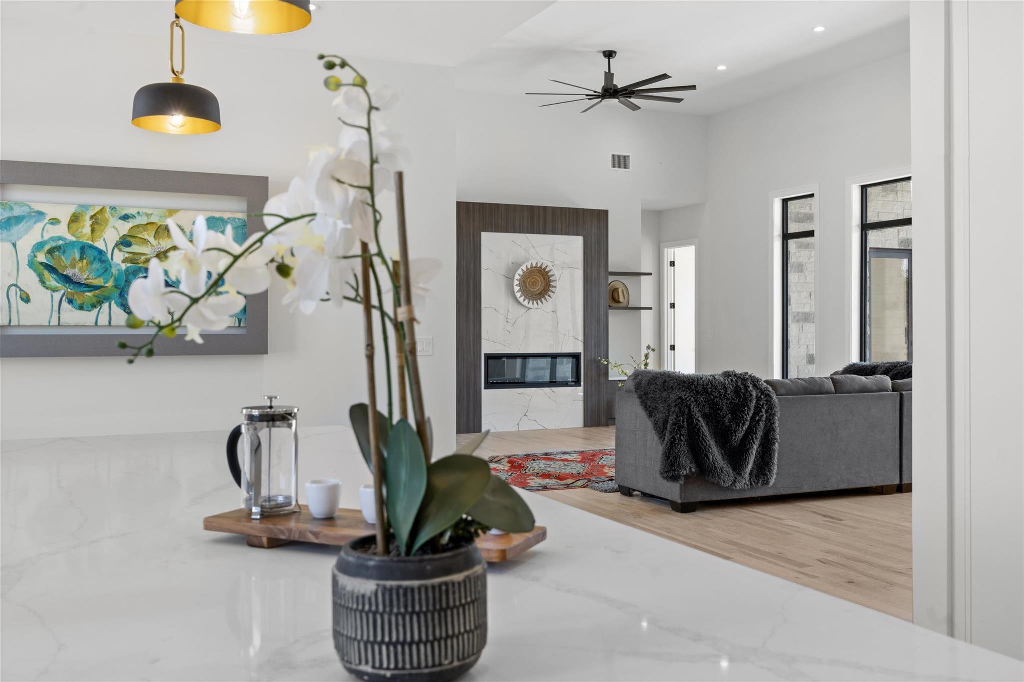 Bright, airy open-concept living area with a cont