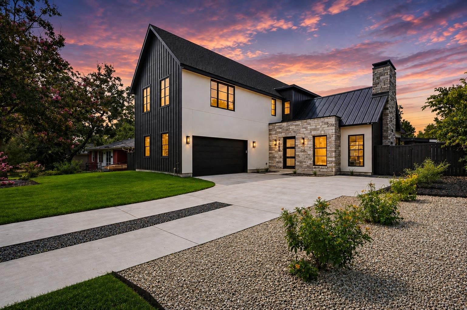 A modern facade with striking dark siding, light 