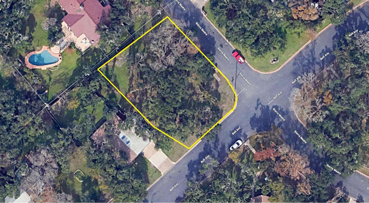 A spacious lot, outlined in yellow, offers abunda