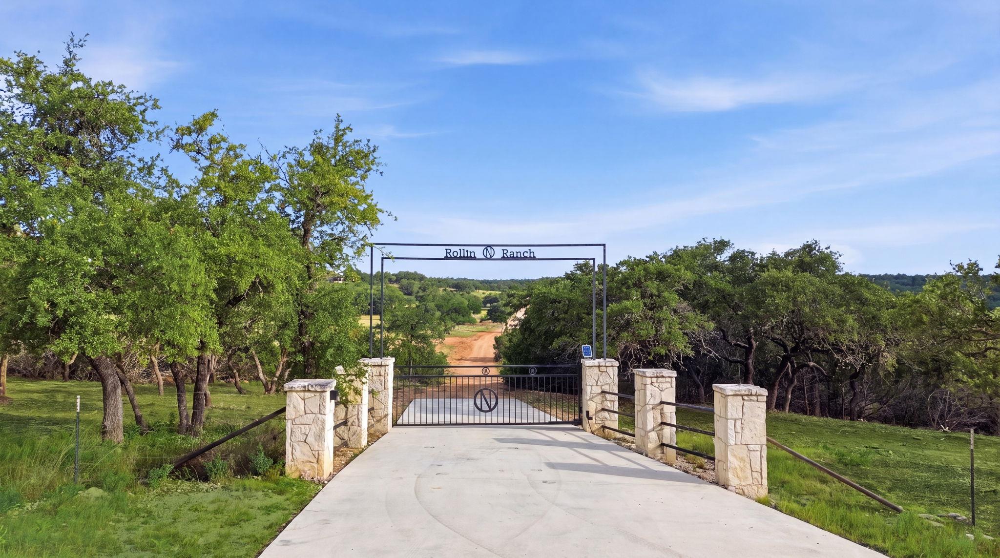 A grand entrance awaits at this secluded ranch, f