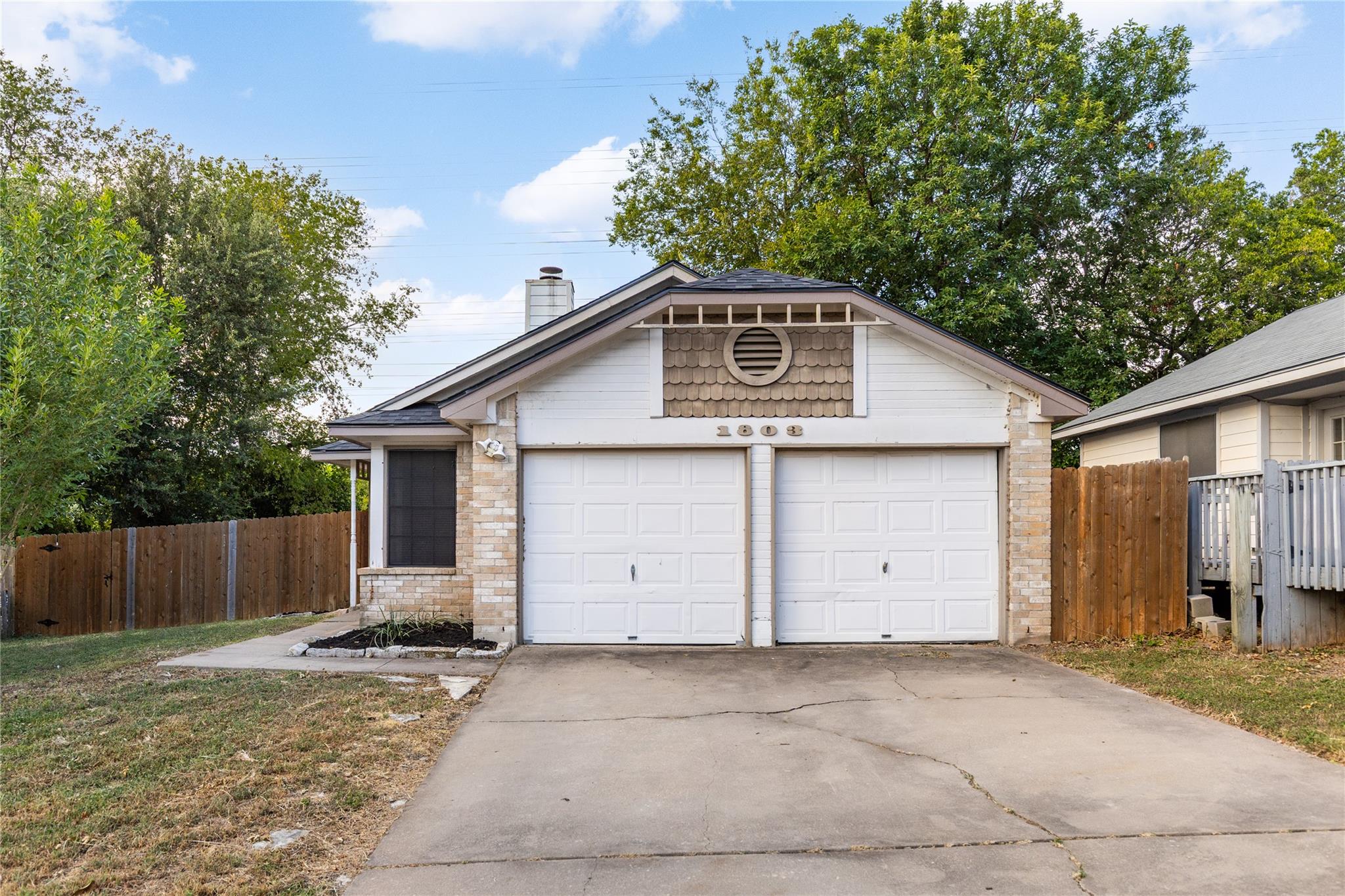 A charming single-story residence with an attache