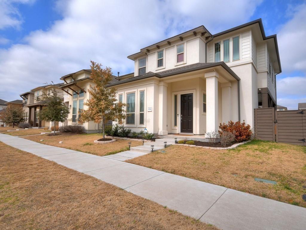 Crisp architectural lines and a welcoming front p
