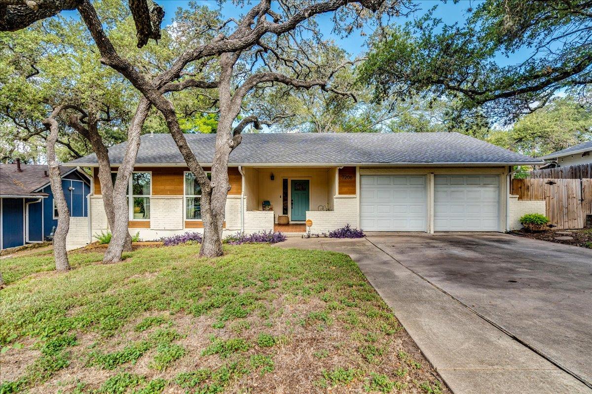 A charming single-story residence with mature tre