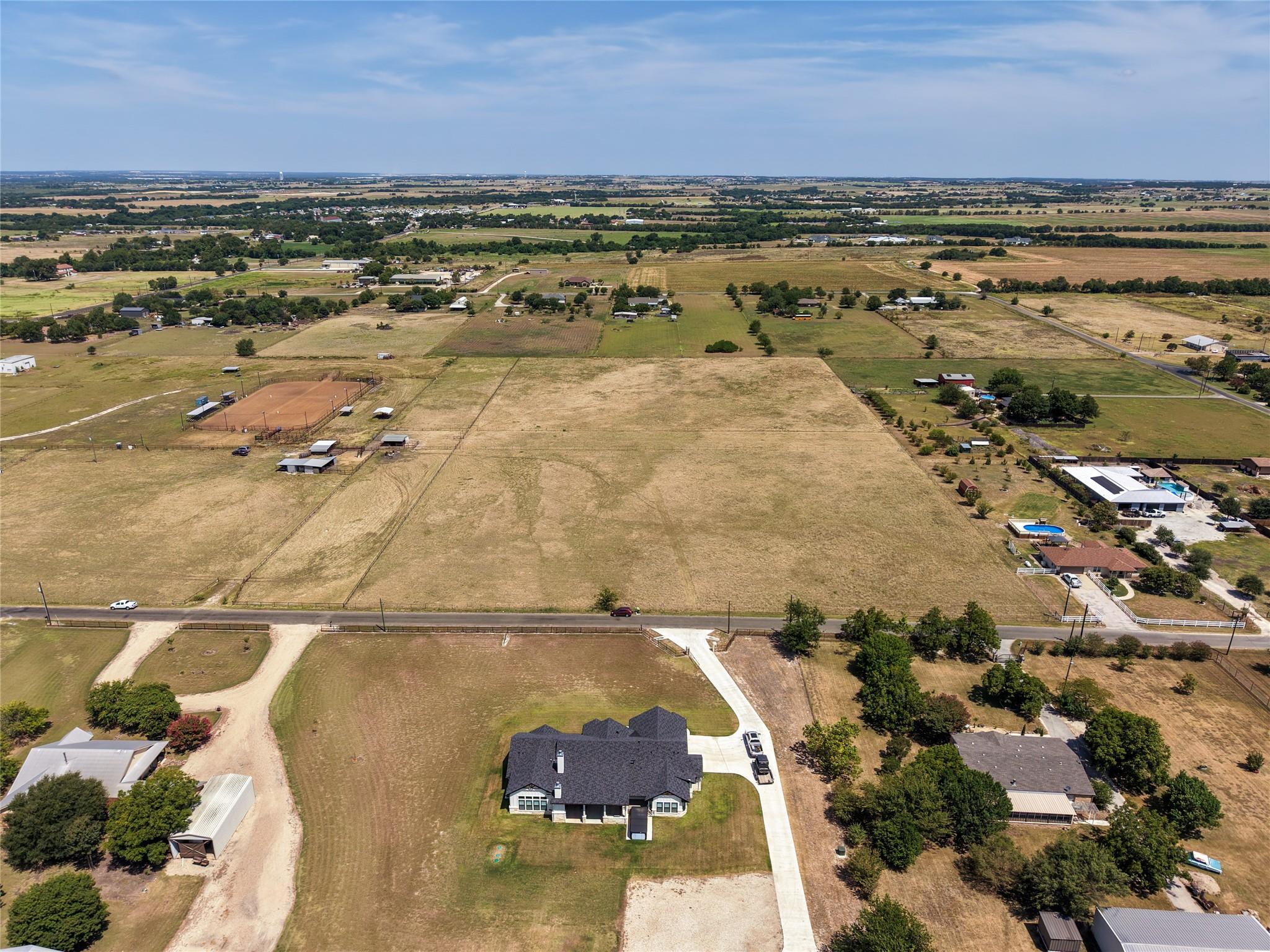 Observe this property with a vast open lot, ample