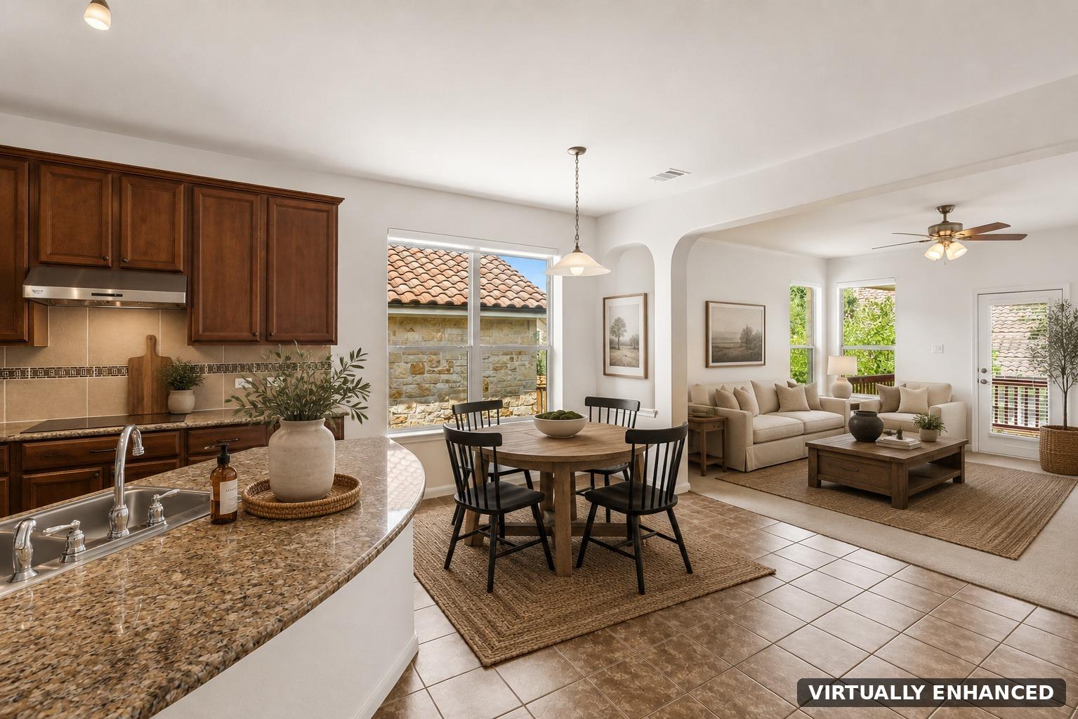 An open-concept layout unites the kitchen, dining
