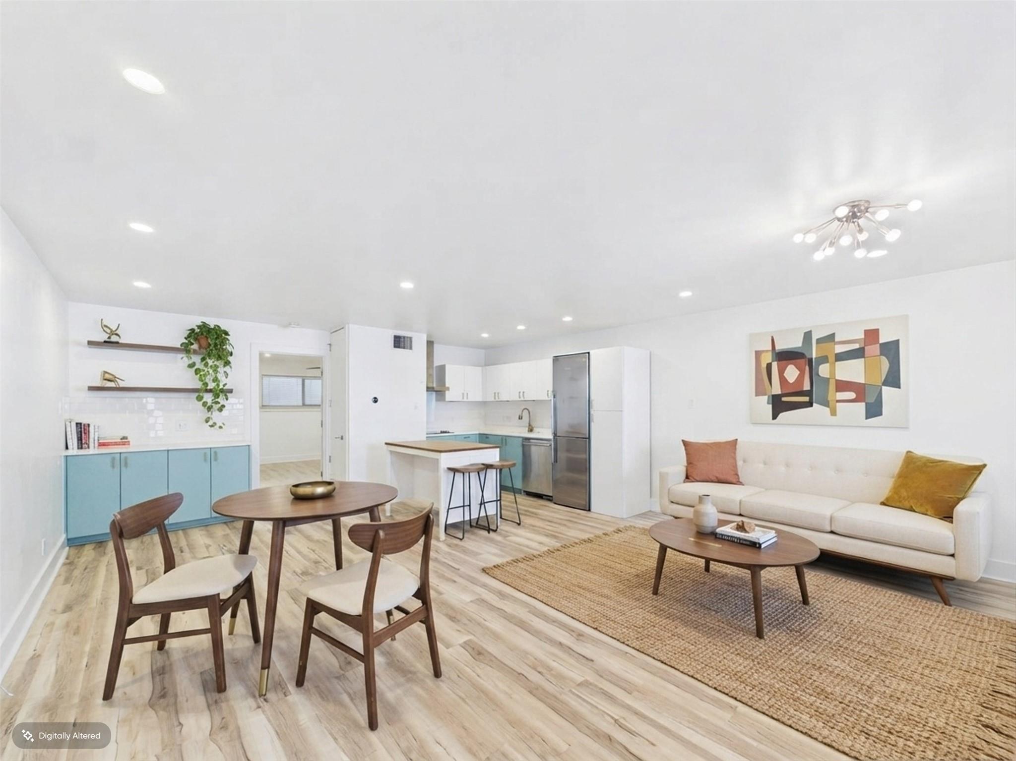 An open floorplan seamlessly connects the central