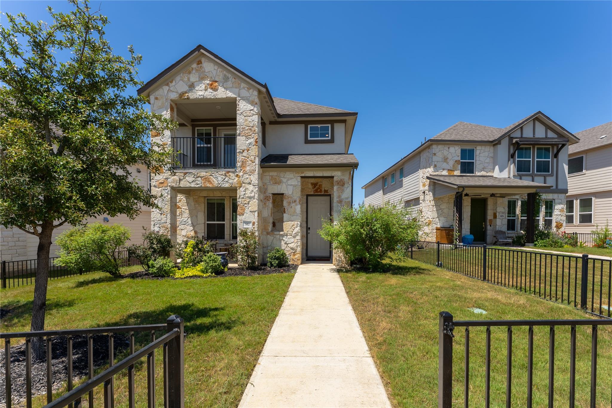 Natural stone masonry and a private upper balcony
