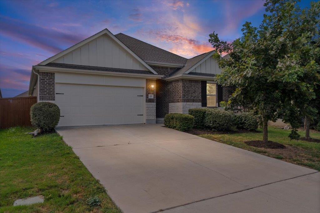 A well-maintained single-story home with a wide c