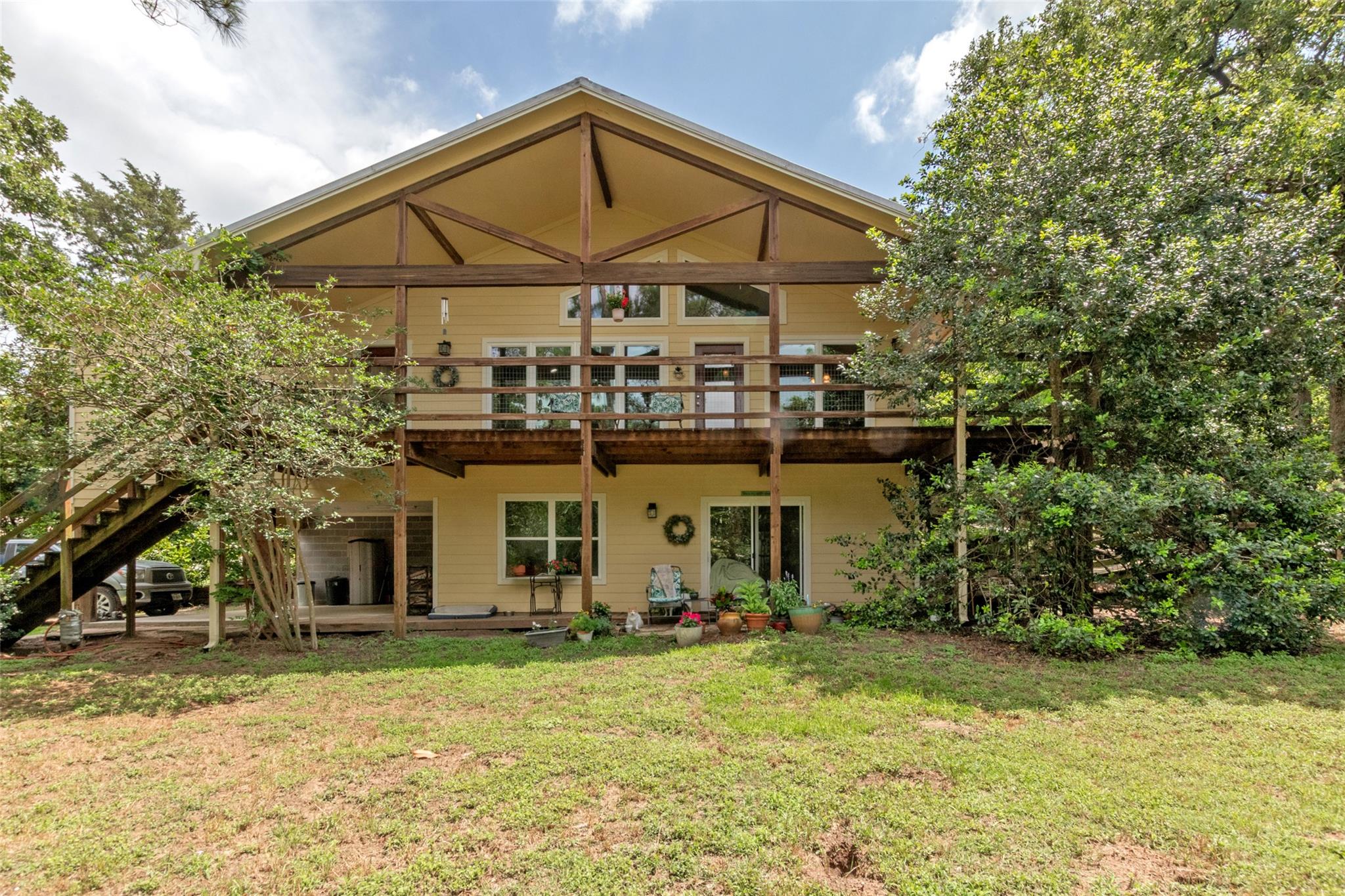 Two-story home features a welcoming wrap-around d