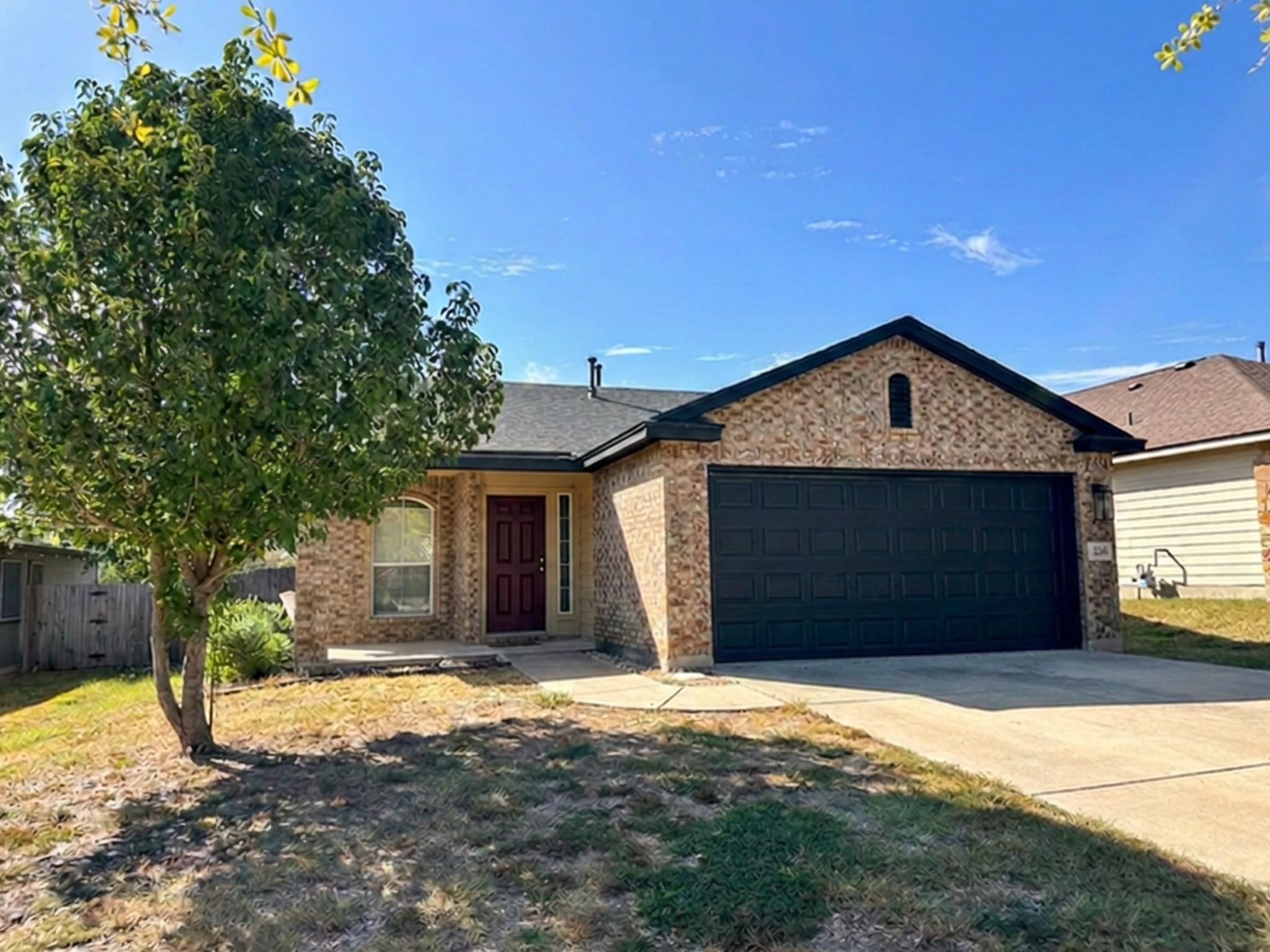 Classic brick exterior highlights this single-sto