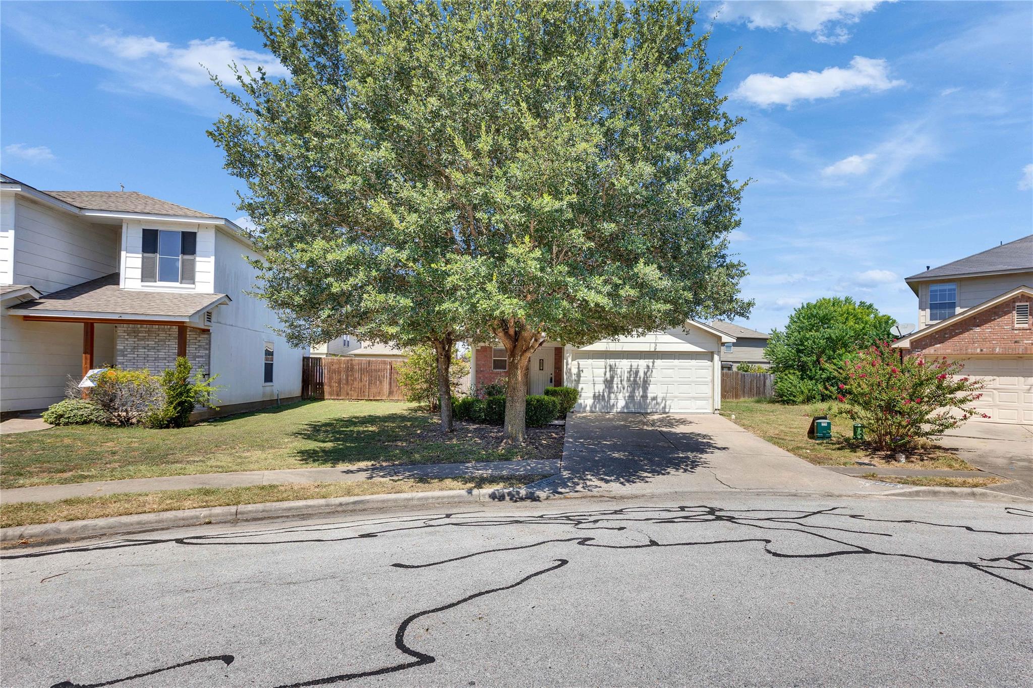 A welcoming street view of a suburban home featur