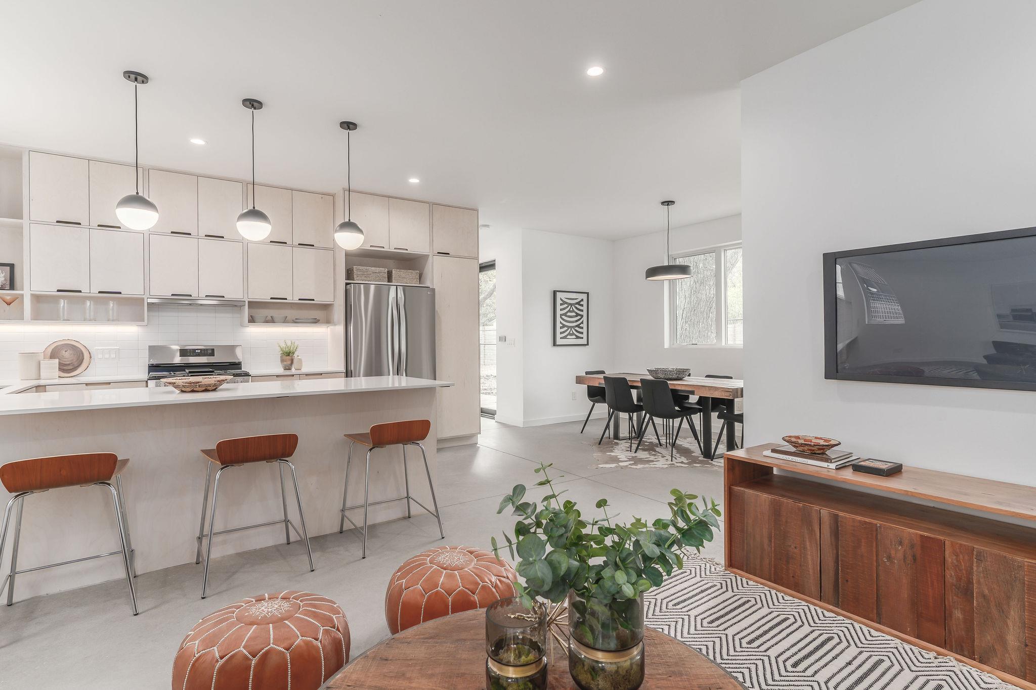 Clean lines and smooth concrete floors define thi