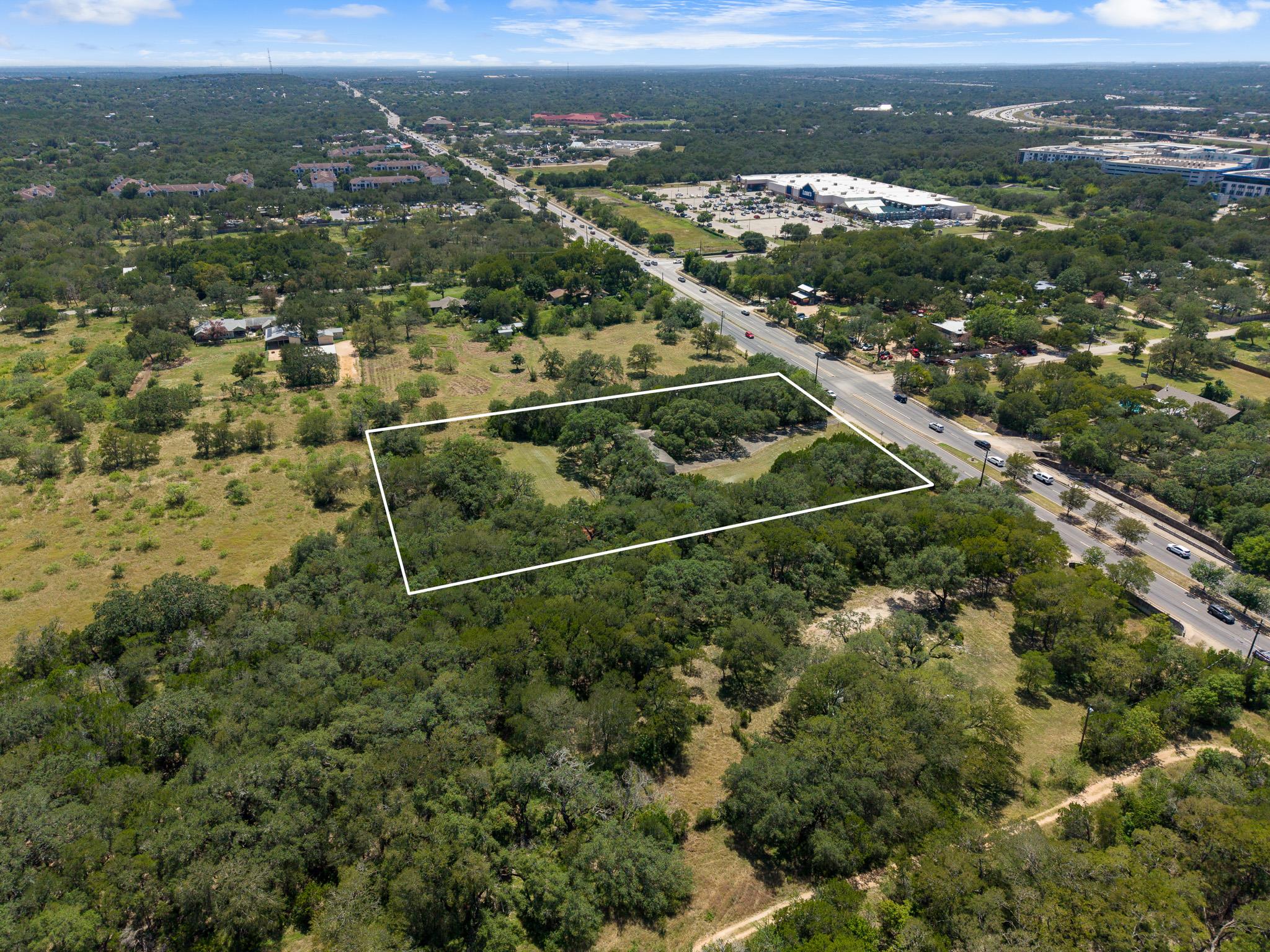 A spacious, tree-dotted land parcel awaits your v