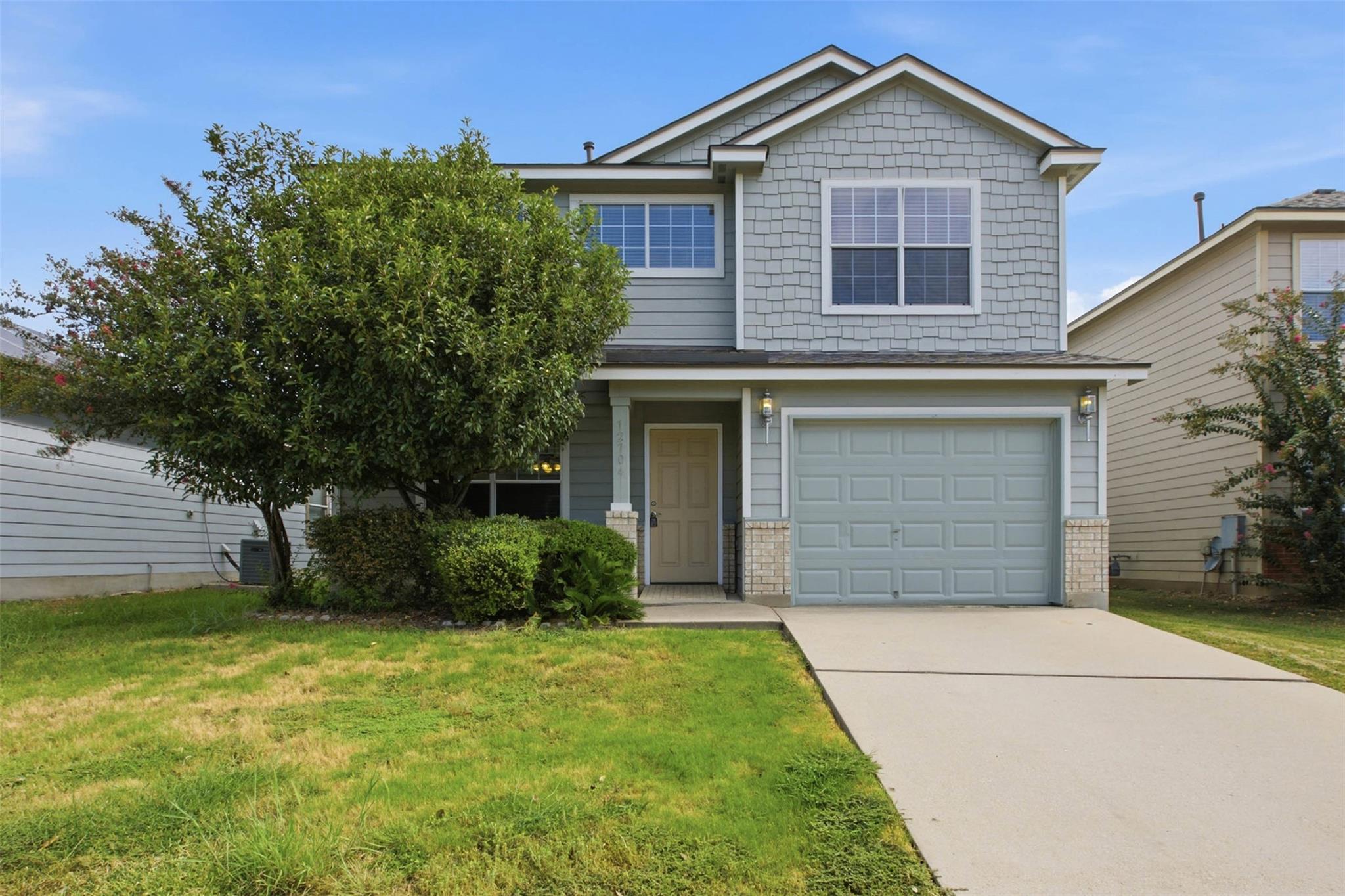 A welcoming facade with a well-maintained lawn an