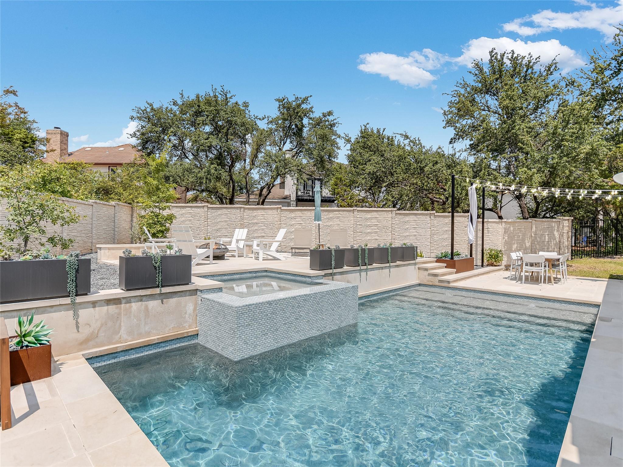 A sparkling swimming pool and integrated spa high