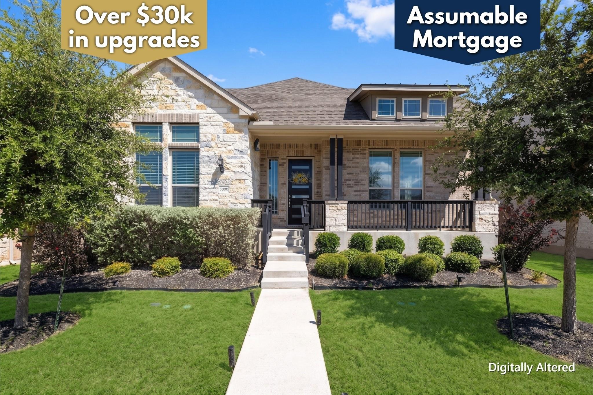 Exquisite masonry accents complement the architec