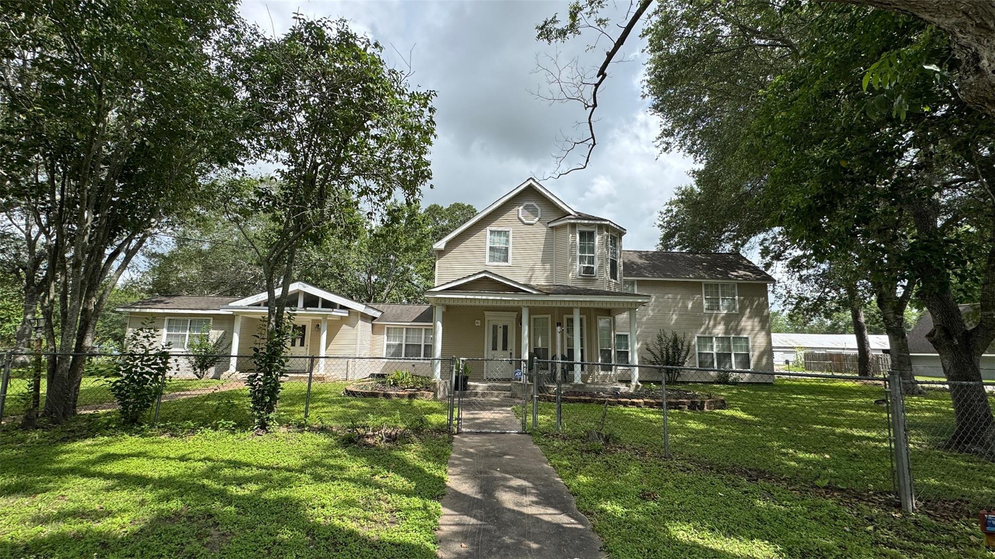 A classic facade with a welcoming covered porch s