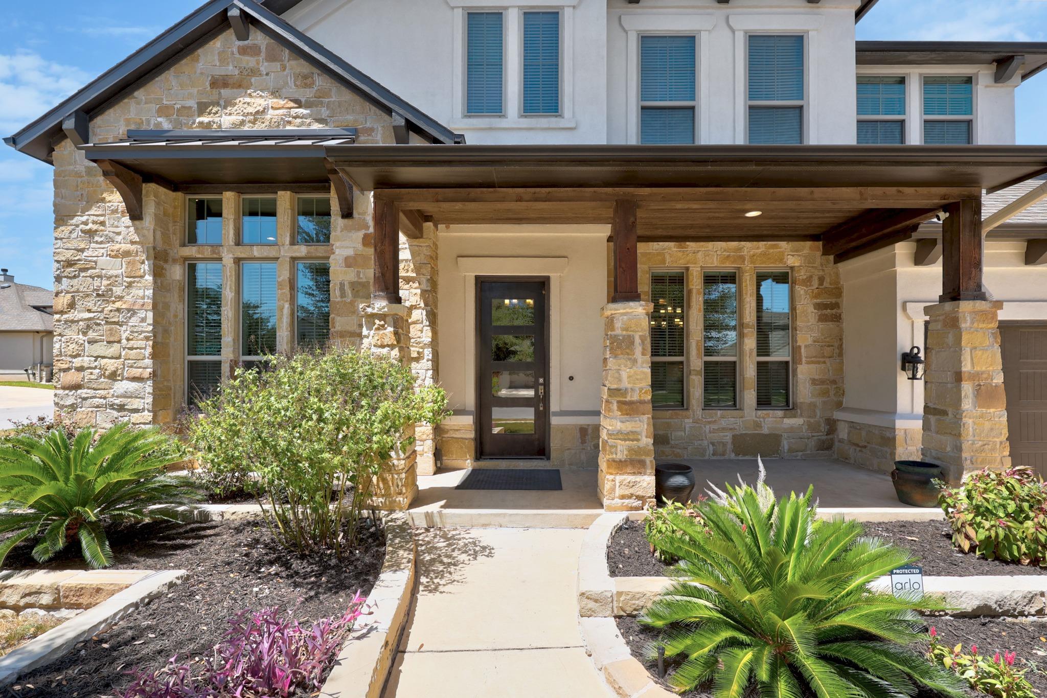 Natural stone and warm wood accents frame the inv