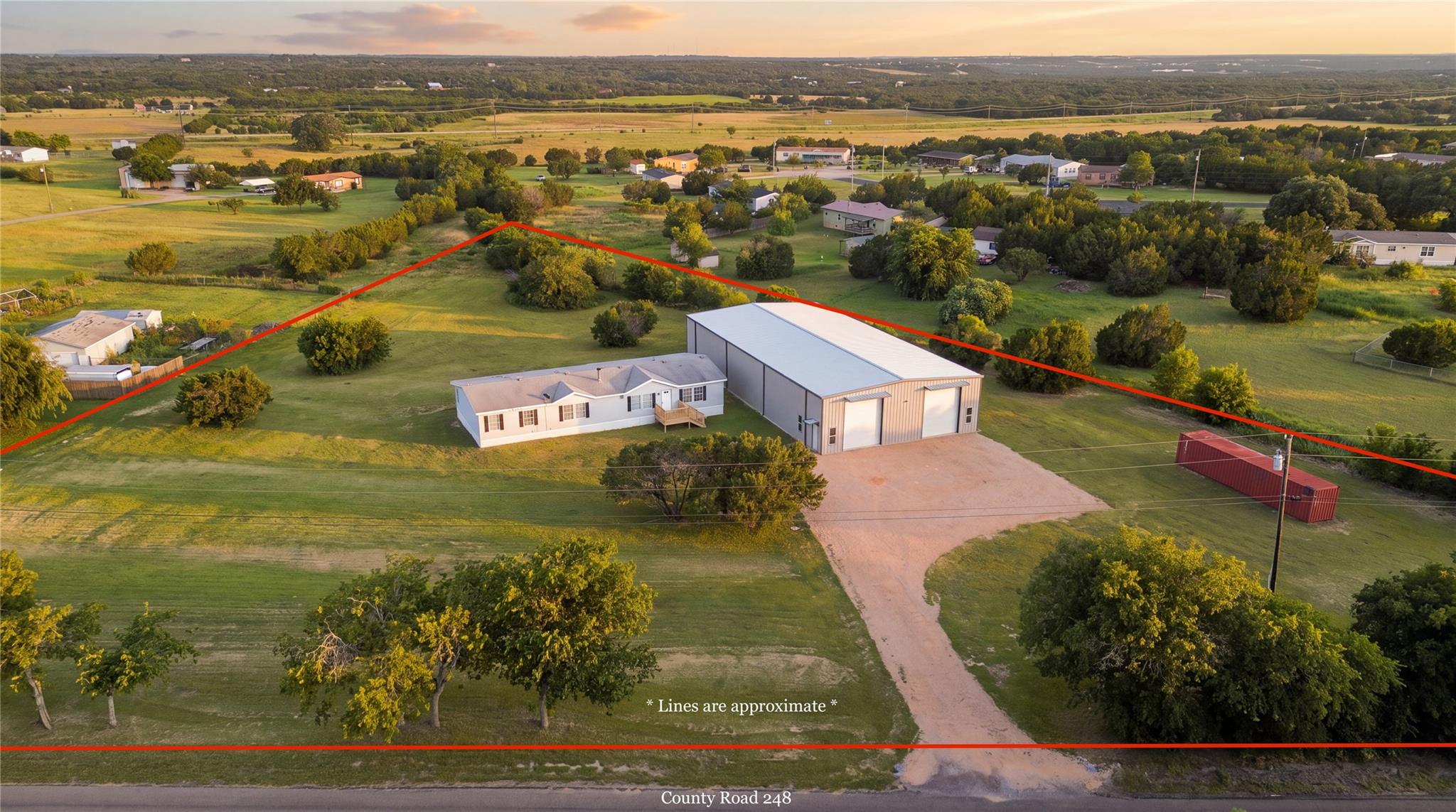 An expansive rural property features a manufactur