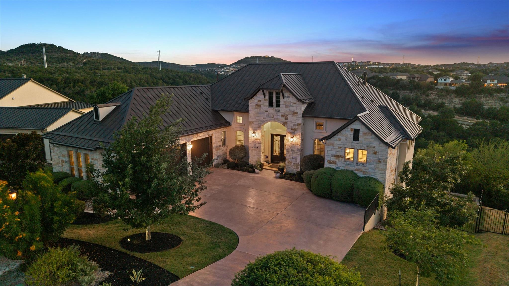 An elegant stone exterior and a grand arched entr