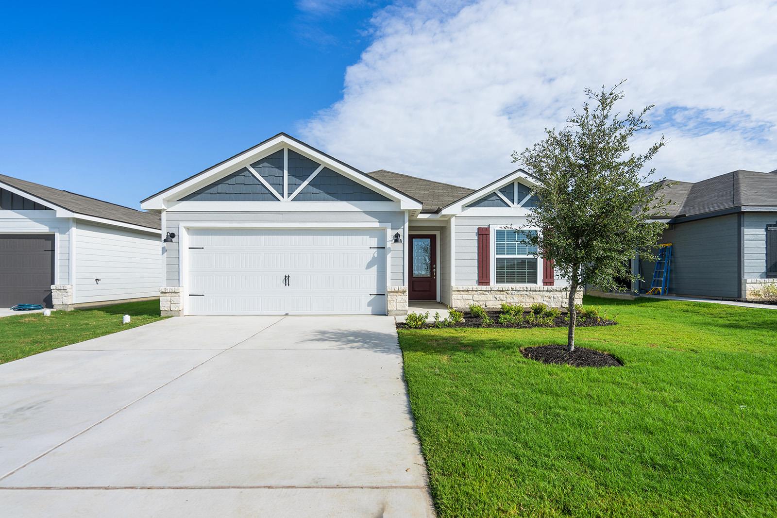 Clean architectural lines and a manicured lawn de