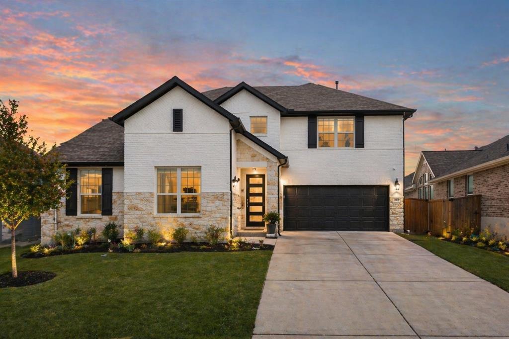 An inviting stone and brick facade creates immedi