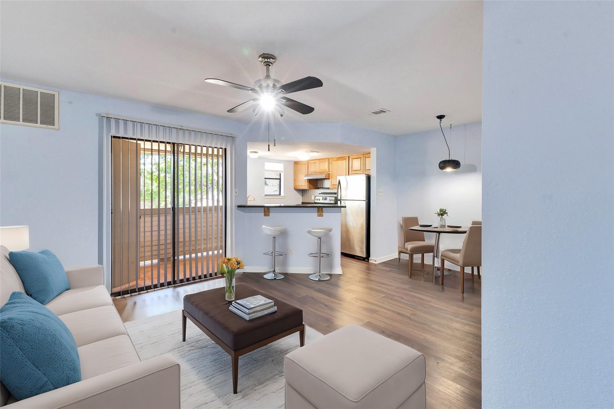 An open floor plan seamlessly connects the main l