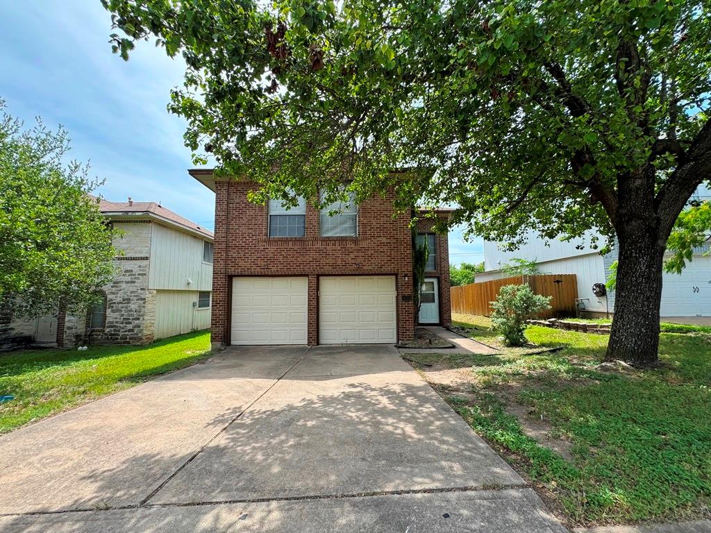 View of front of property with an attached garage
