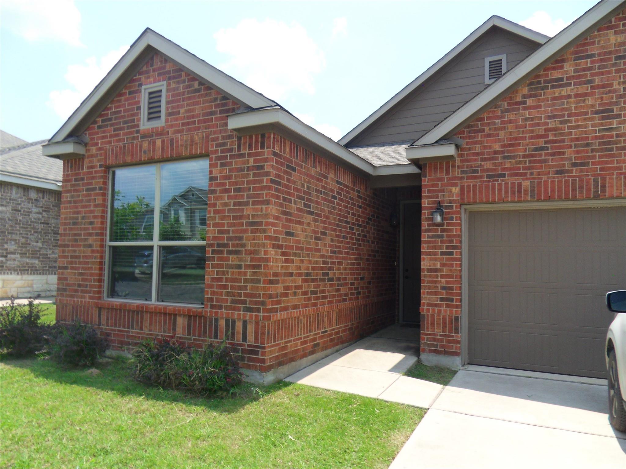 Classic brick craftsmanship defines this charming