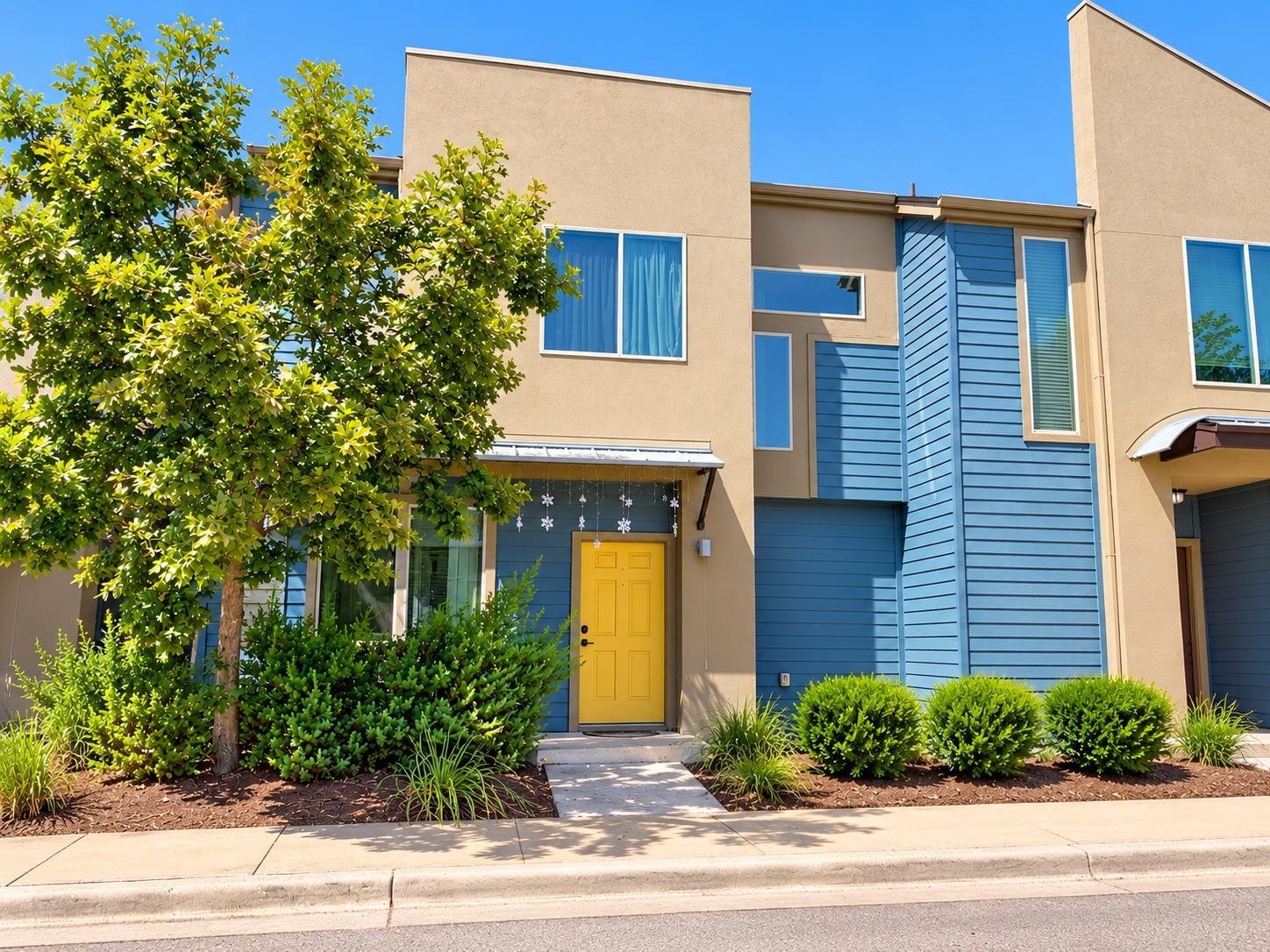Clean lines and modern siding frame this contempo