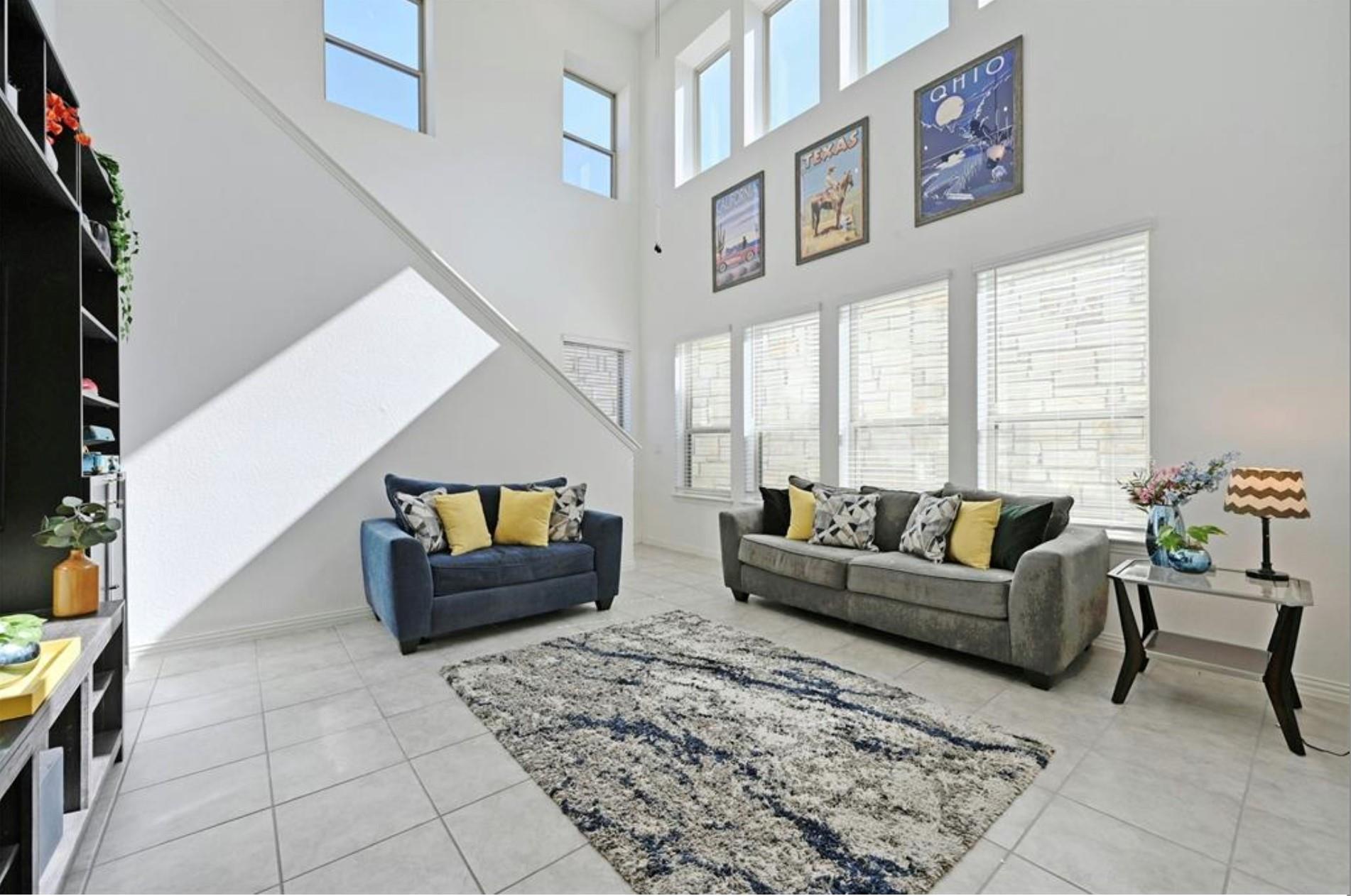 Towering ceilings and two tiers of windows illumi