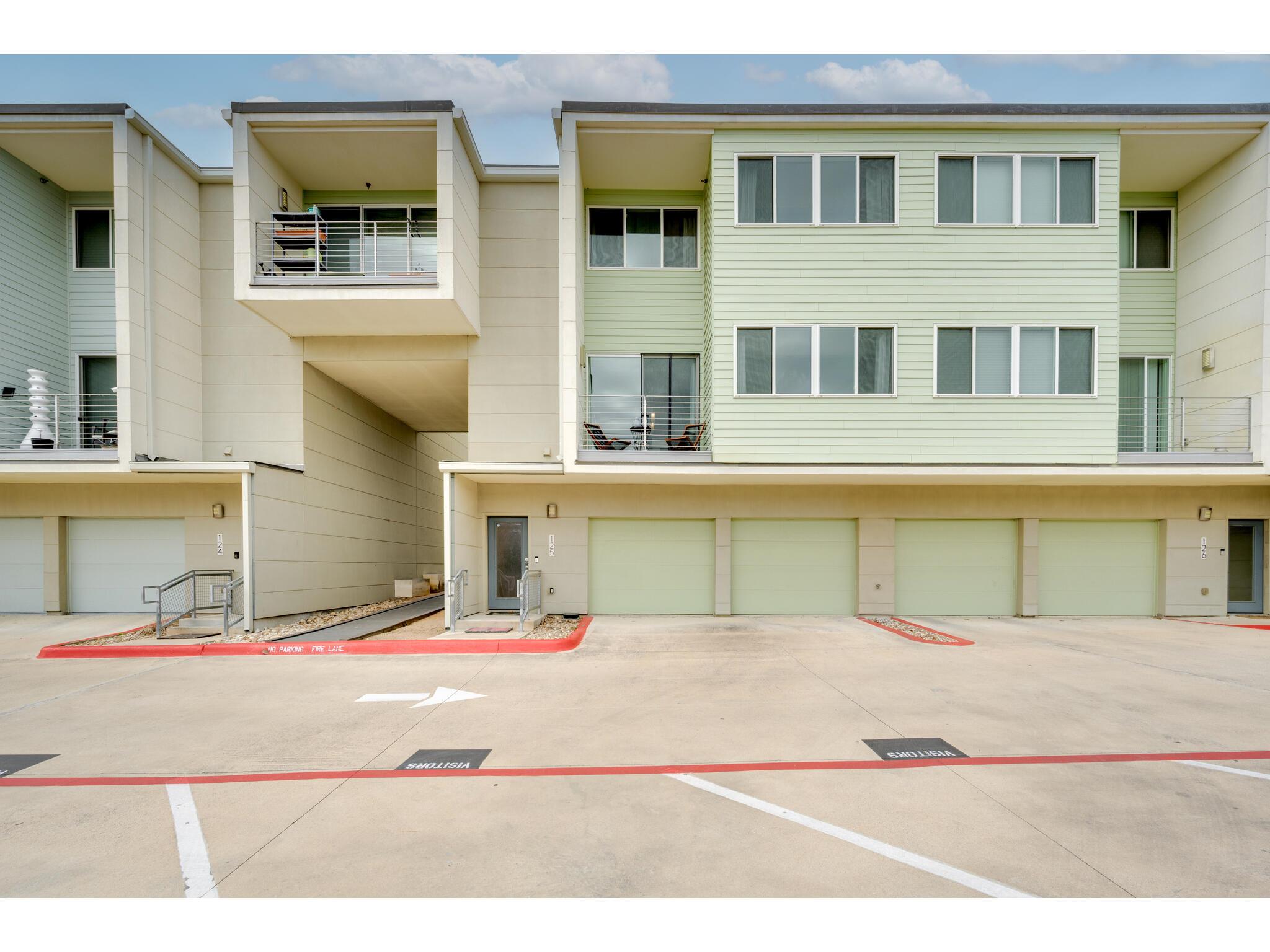 Modern townhomes feature private garages, elevate