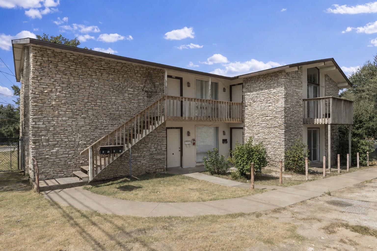 Textured stone veneer creates a distinctive exter