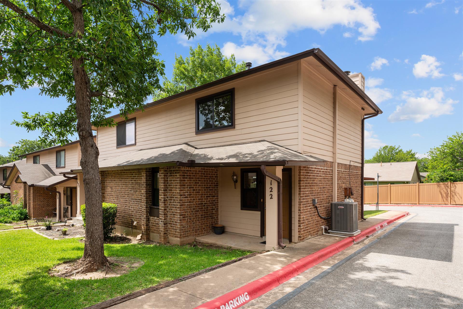 Classic brick and siding accents define this char